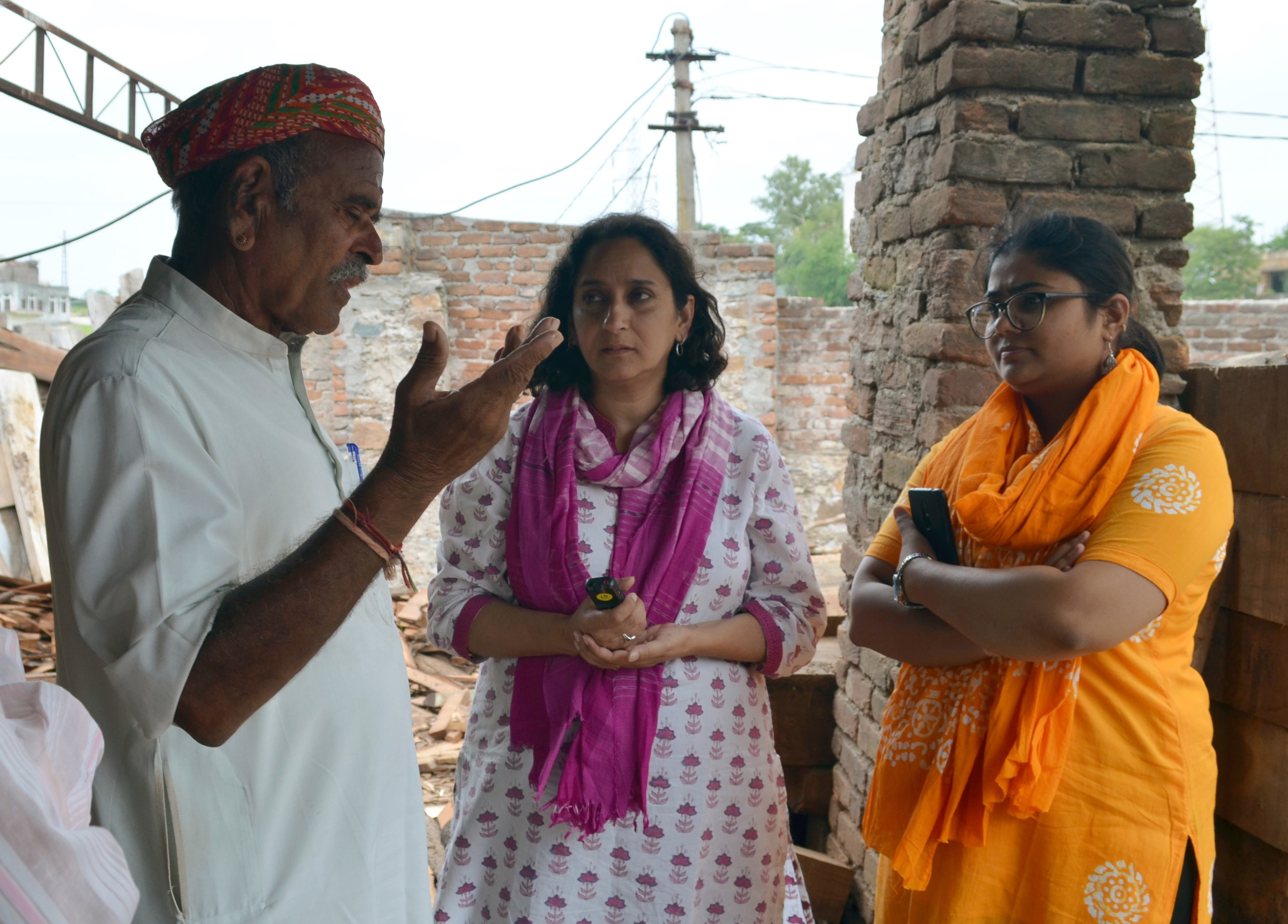 Meena Khandelwal (center) and Student intern Arnima Jain (right) talking with sawmill owner in Rajasthan, Summer 2019.