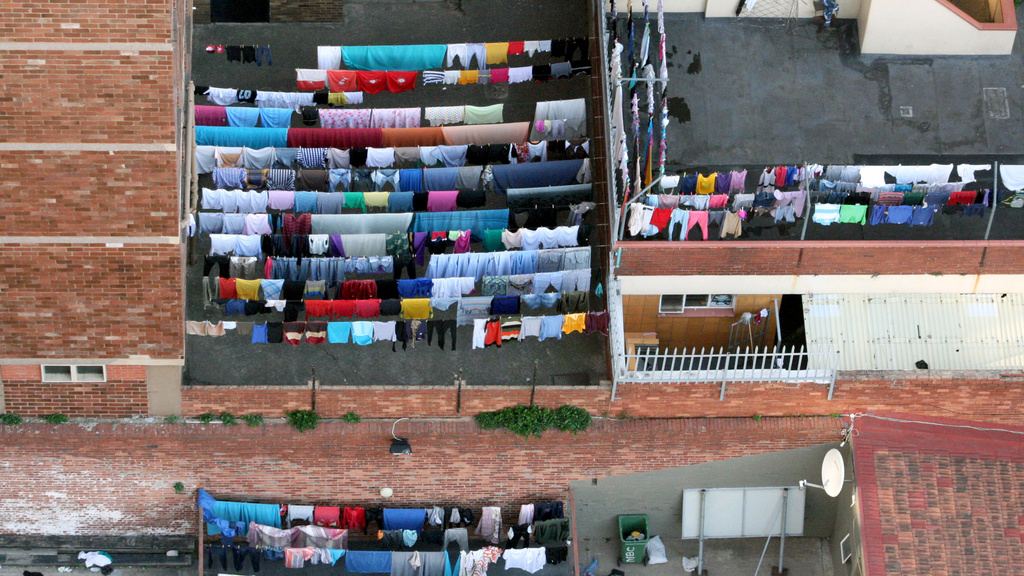 Residents carve out space for clothes-drying in the Point neighborhood of Durban, South Africa.